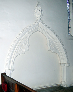 Tomb recess in the north wall of the north aisle February 2011